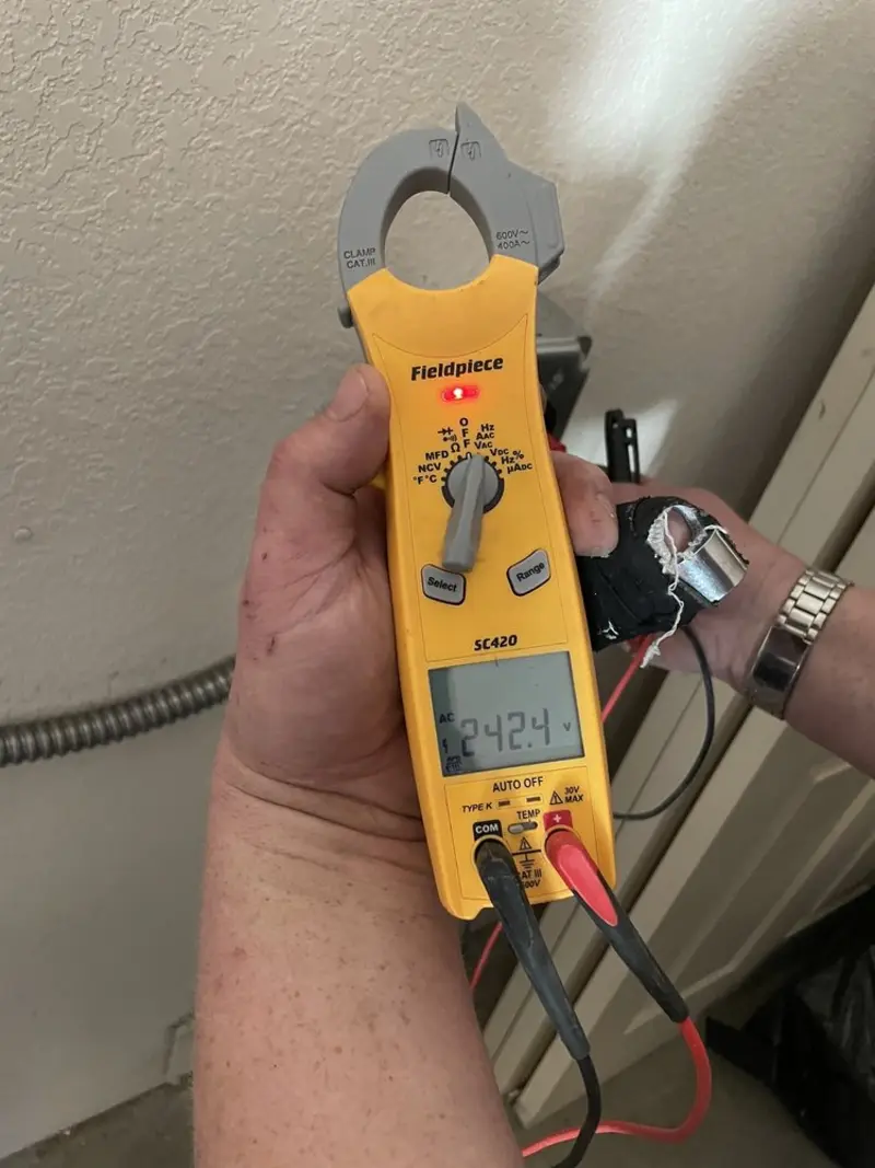 Voltage testing with clamp meter during Generator Installation in Sudden Valley